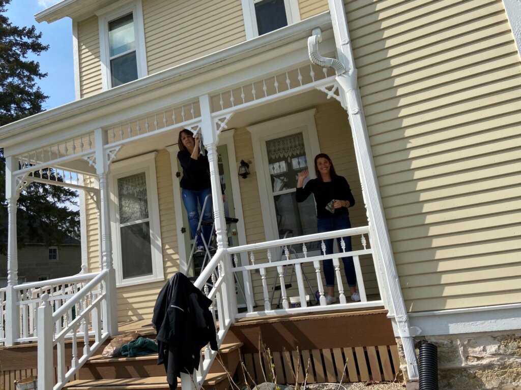 people working on house