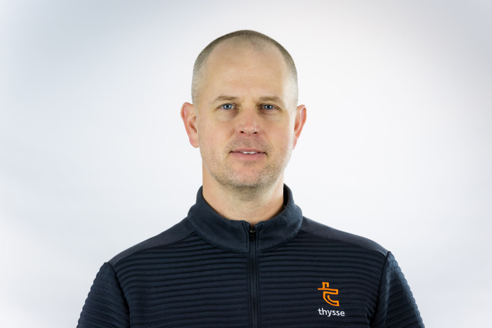 Professional headshot of Jason Thysse