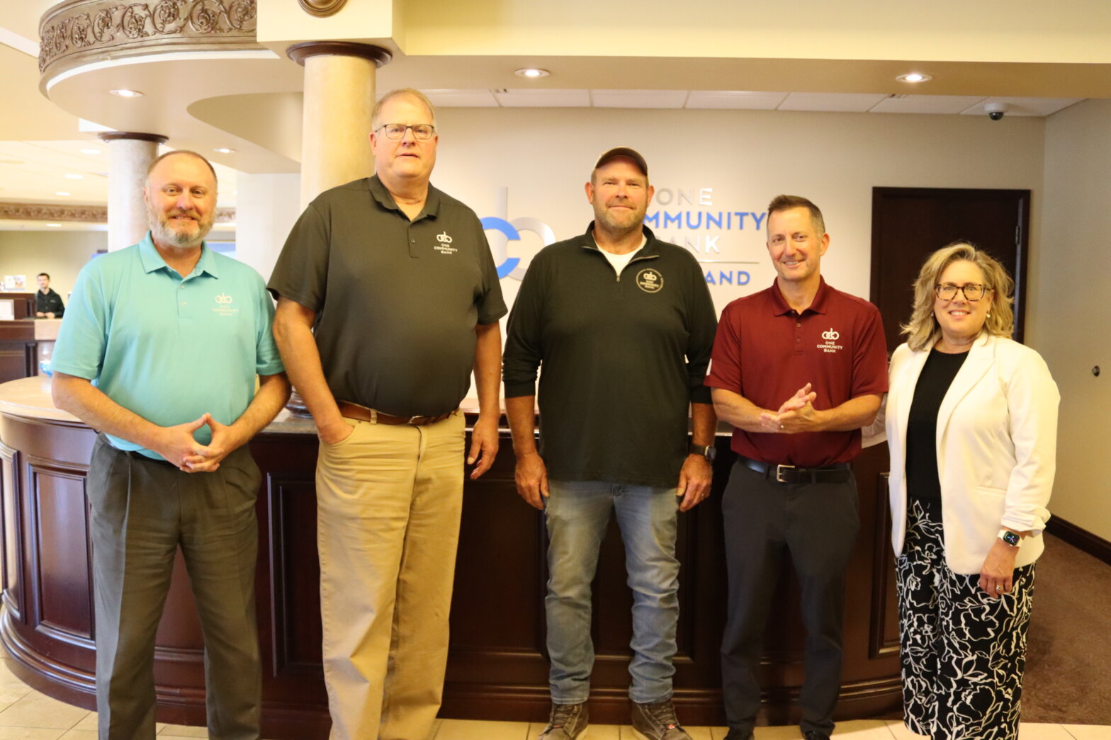 Jeff Versluys, Jim Walker, Snapper Verbsky, Steve Peotter and Holly Heuer group photo for Snapper's last meeting on the Alumni Board